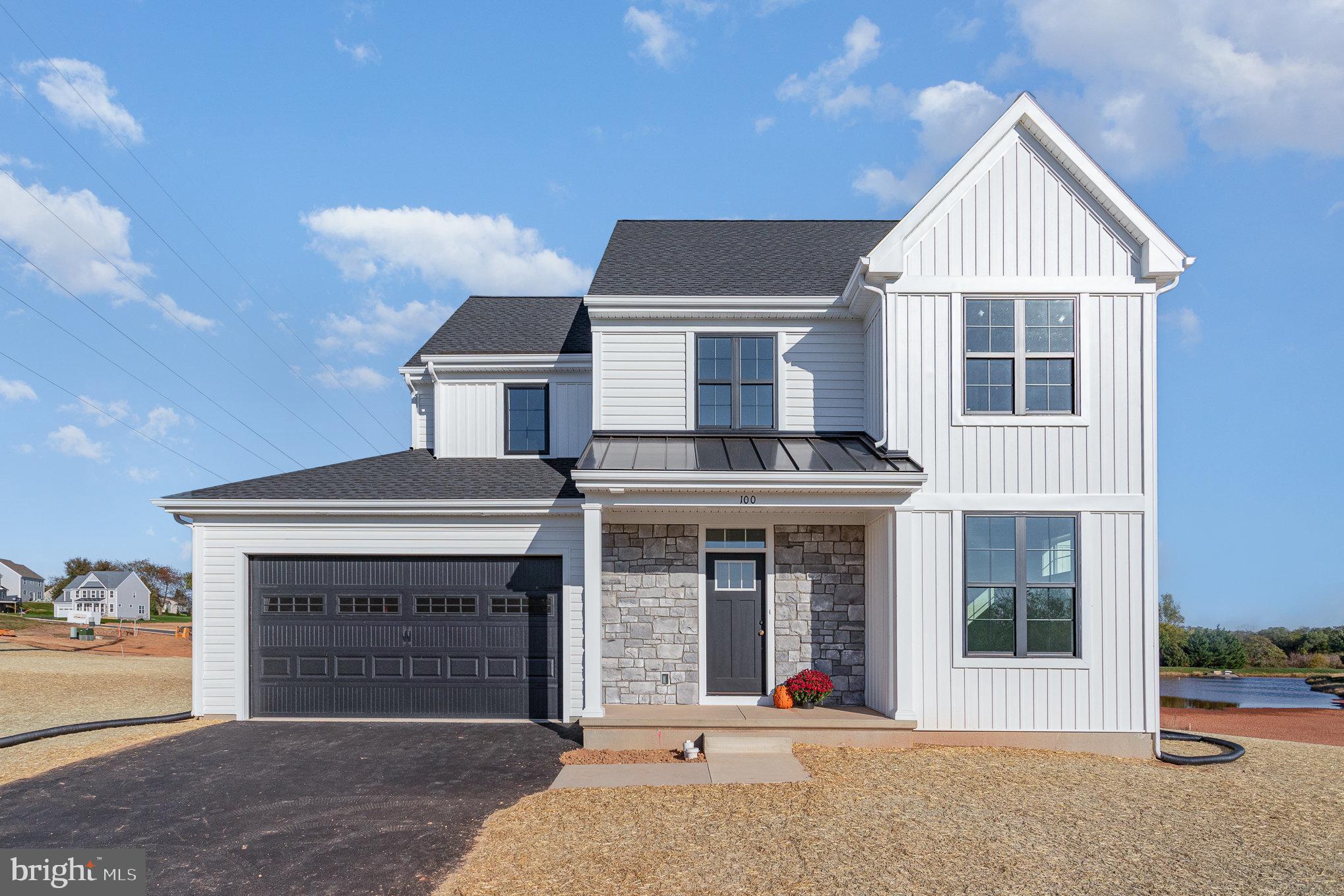 a front view of a house with yard