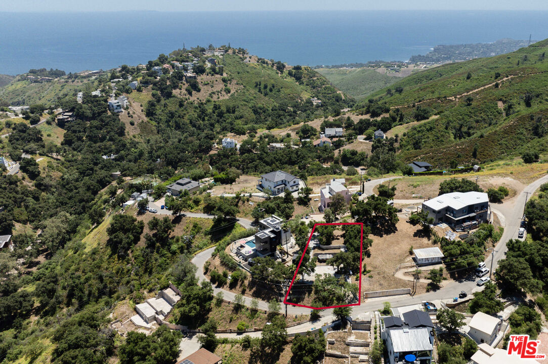 an aerial view of a city with lots of residential buildings