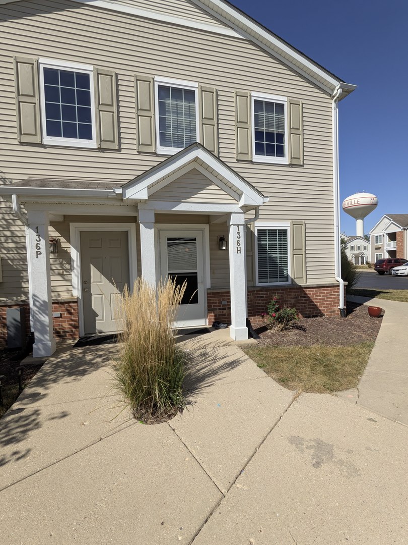 a view of a house with a patio