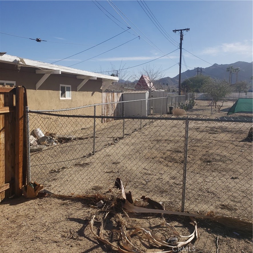 a room with a wooden fence