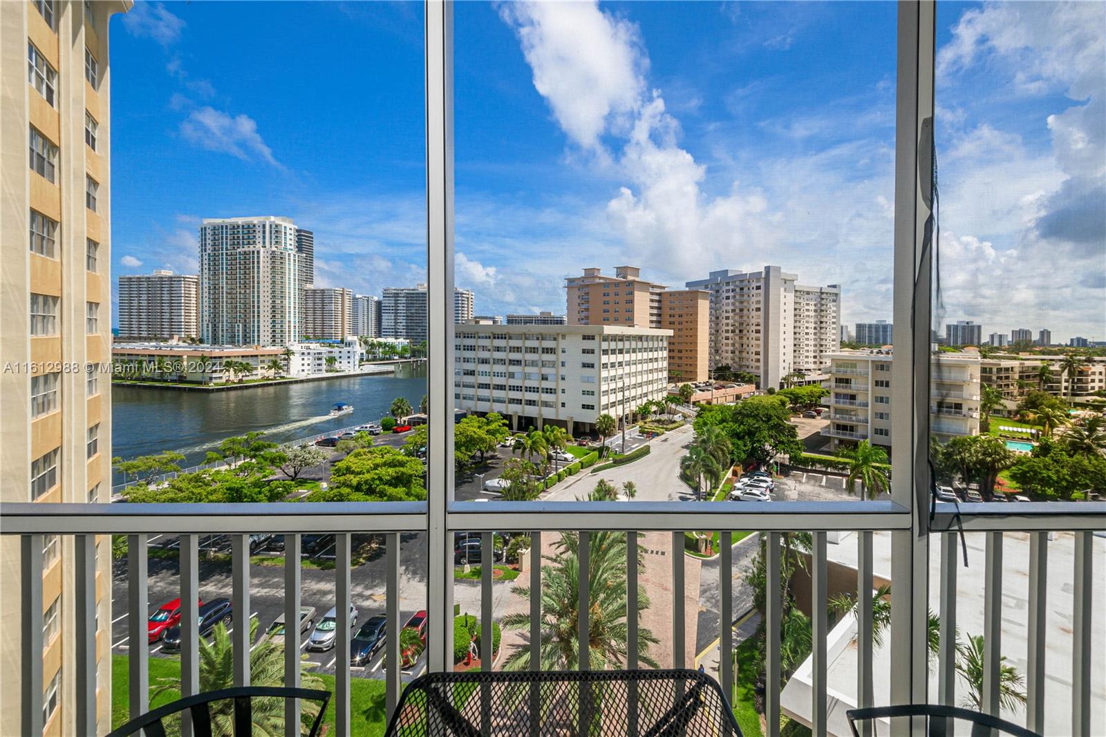 a view of a balcony with city view