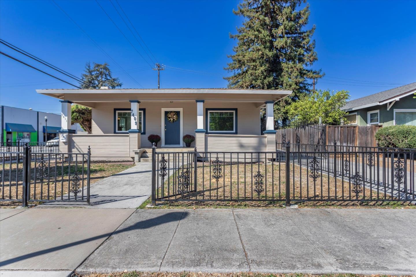 a front view of a house with a porch