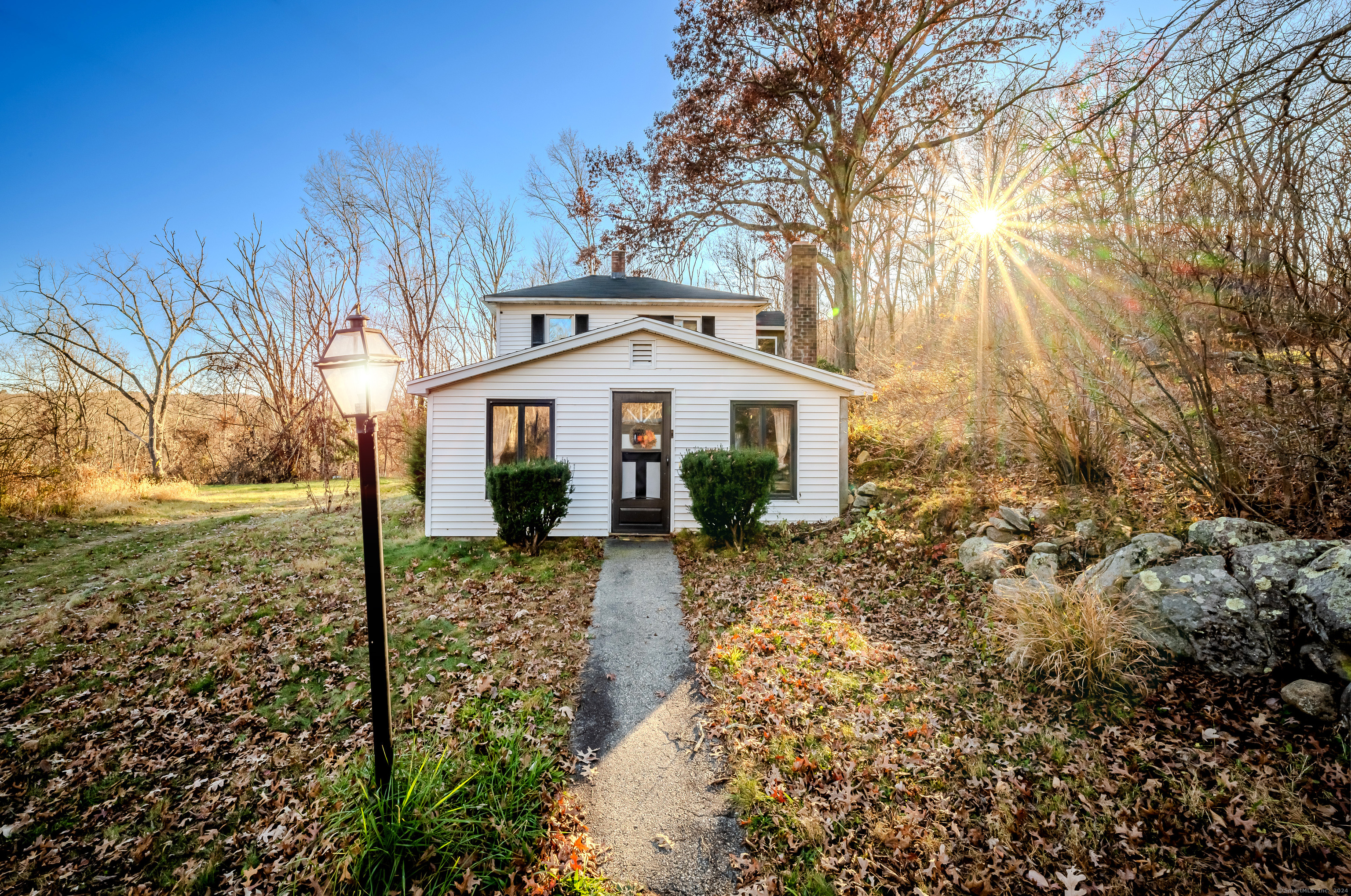 front view of a house with a yard