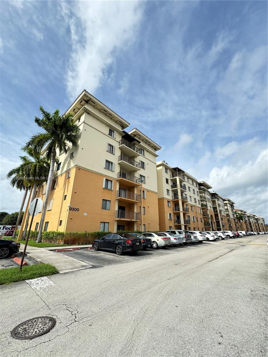 a view of a building with a street