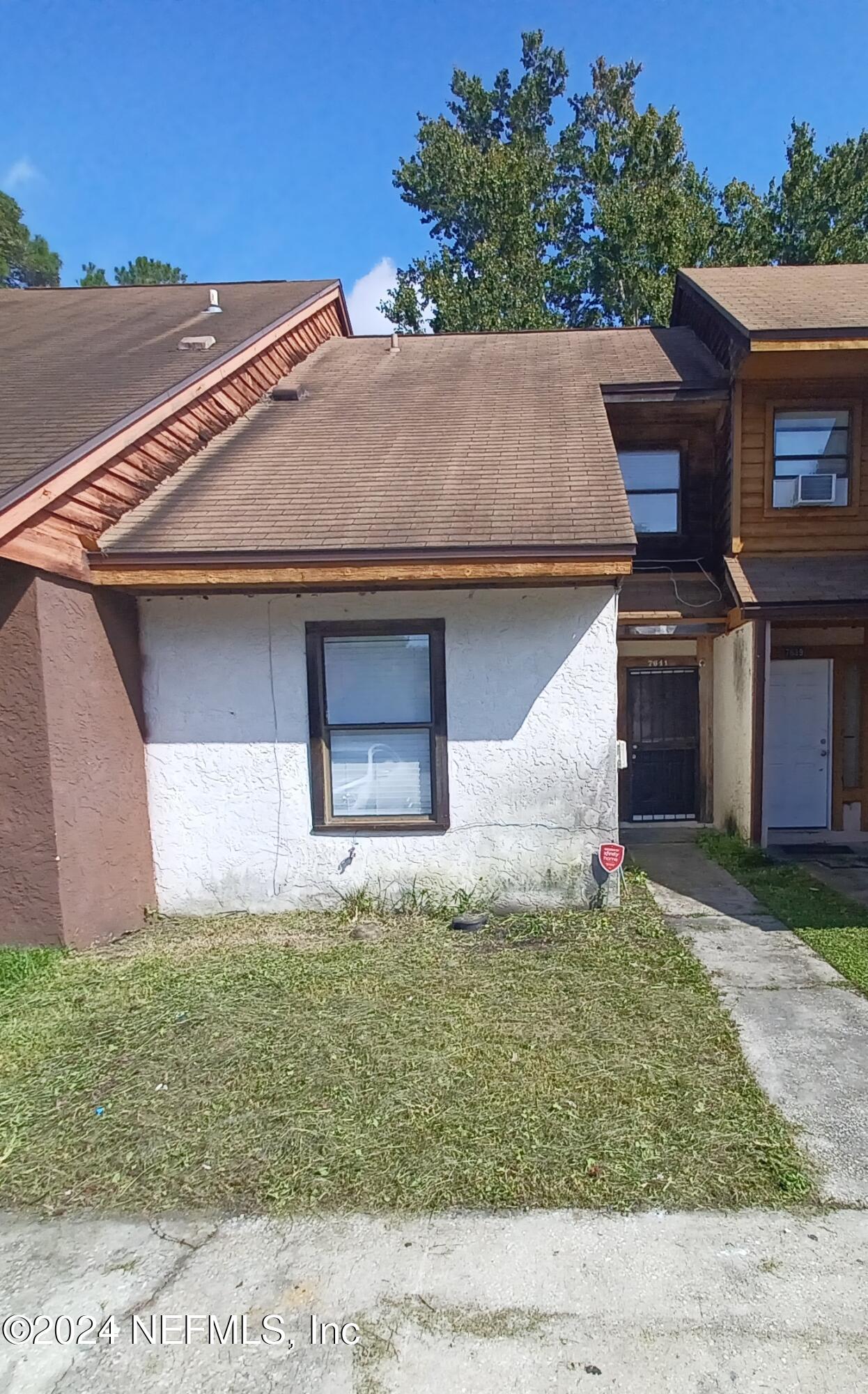 a front view of house with yard