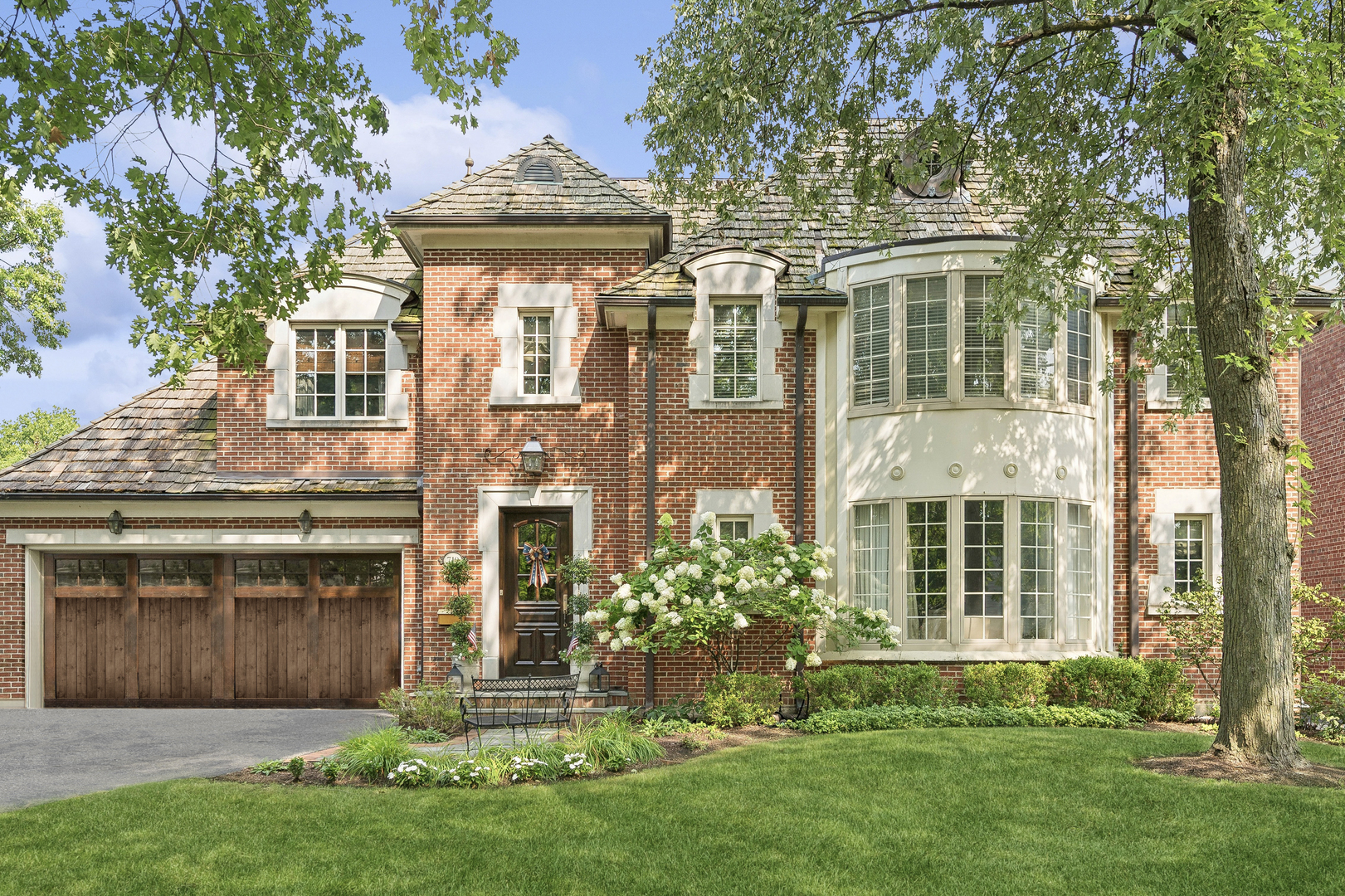 front view of a house with a yard