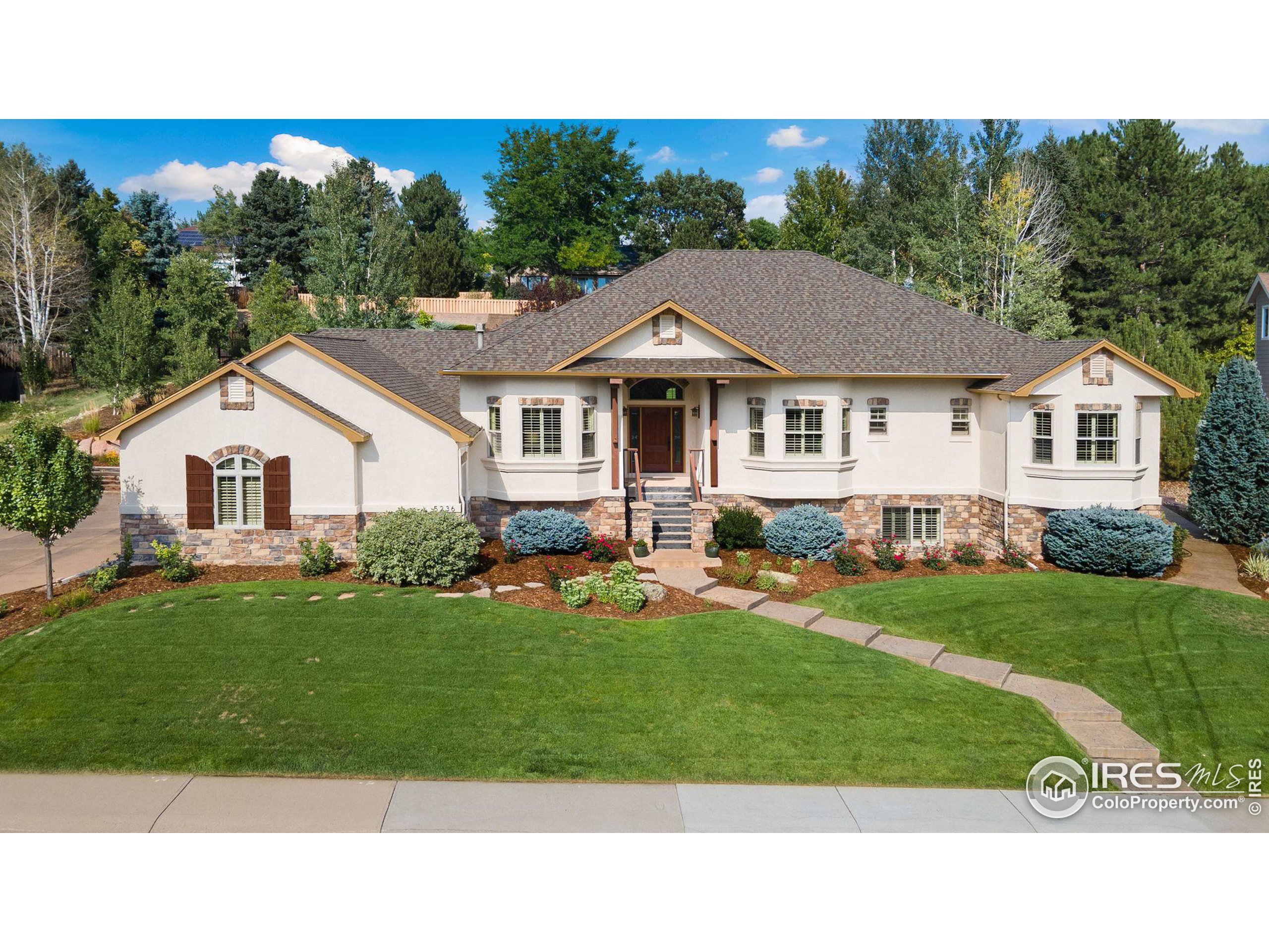 a house view with a garden space