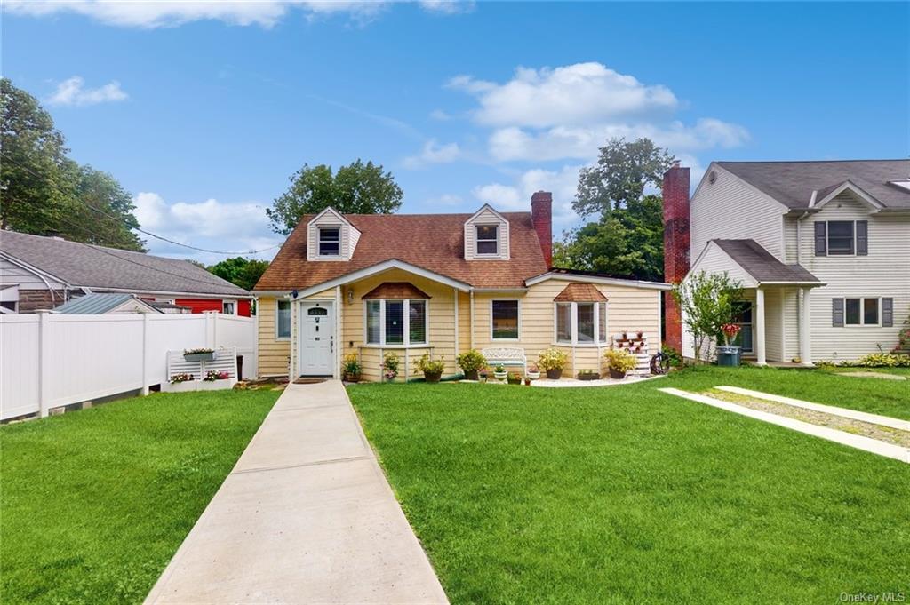 View of front of home with a front yard