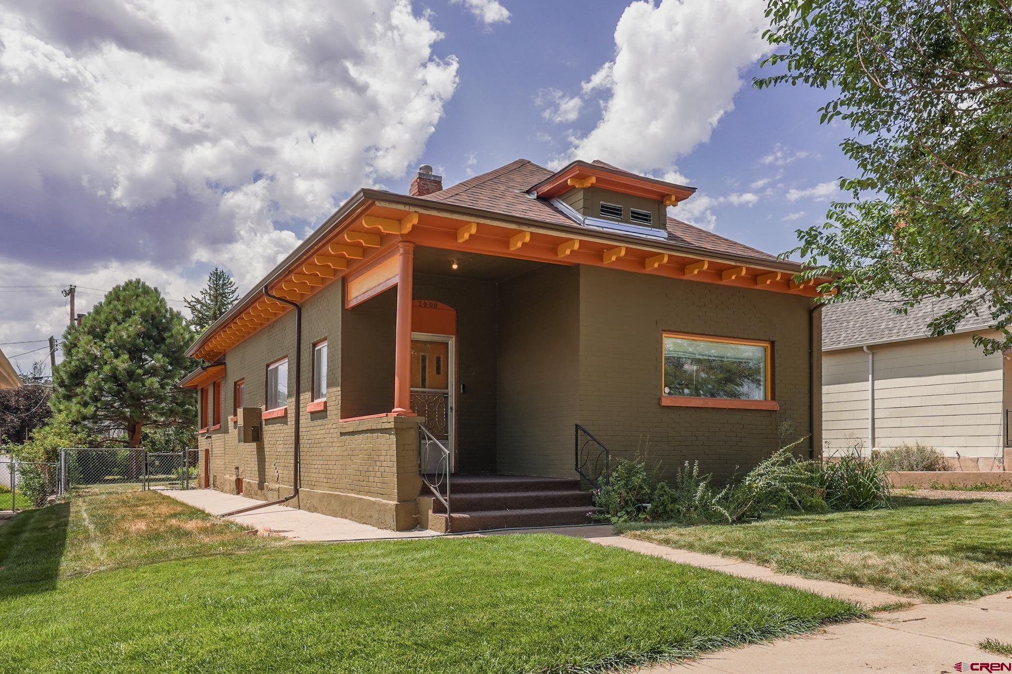 a front view of house with yard