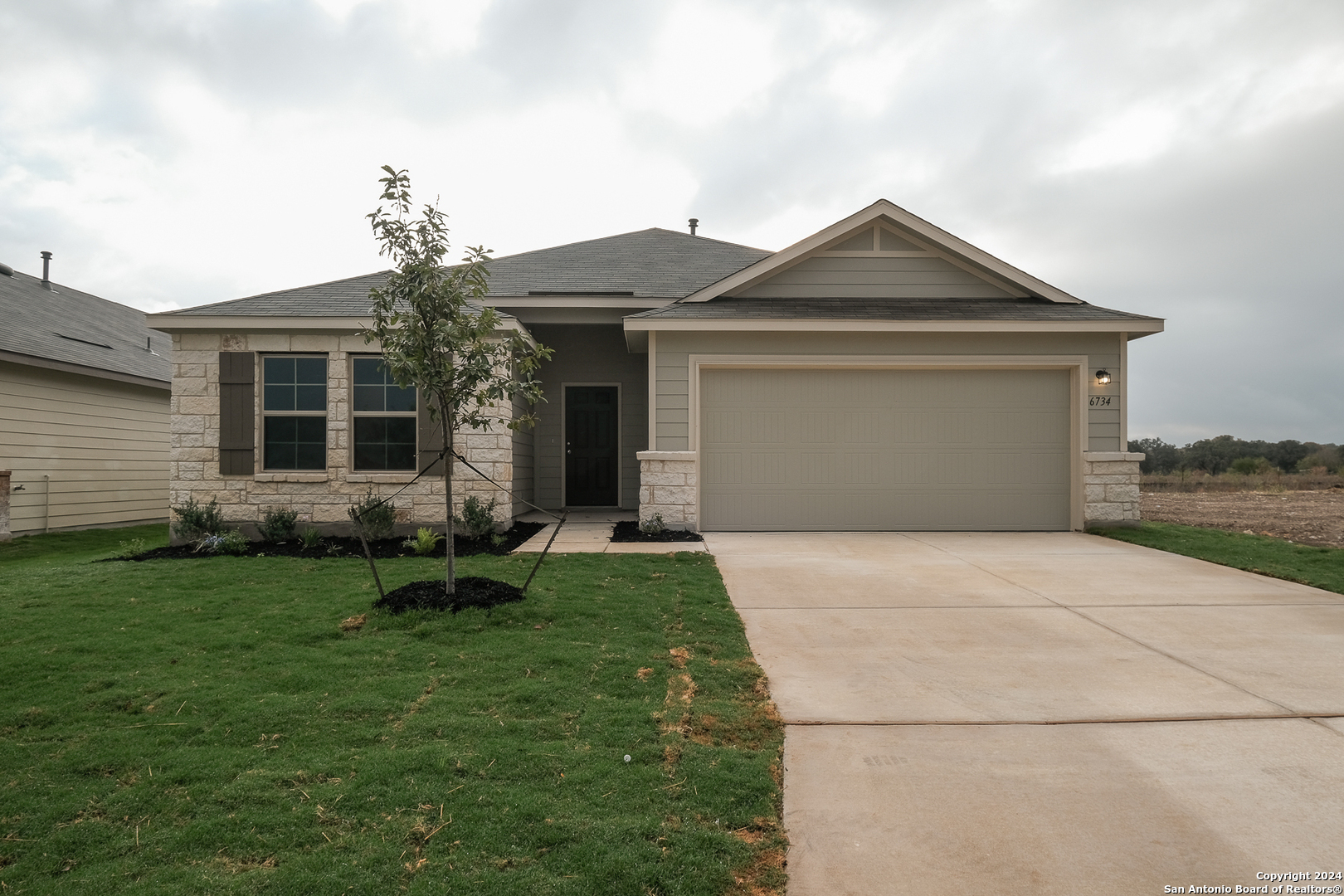 front view of house with a yard