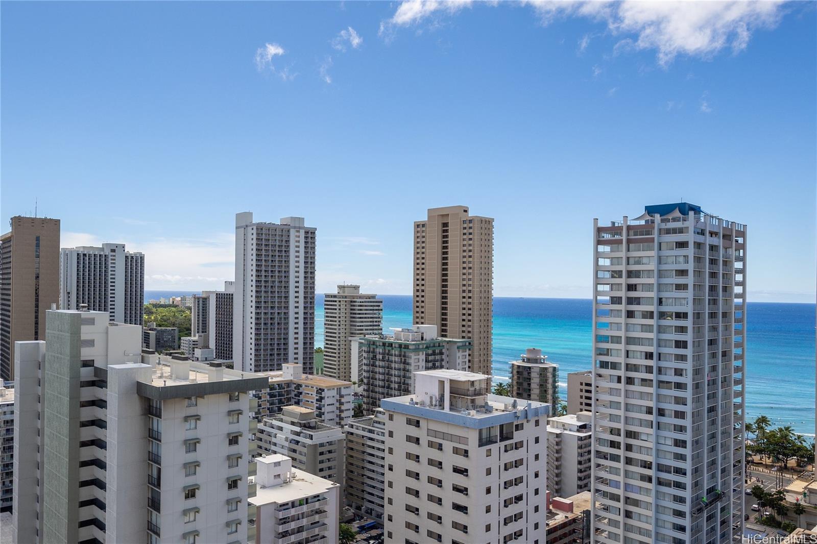 a view of city with tall buildings