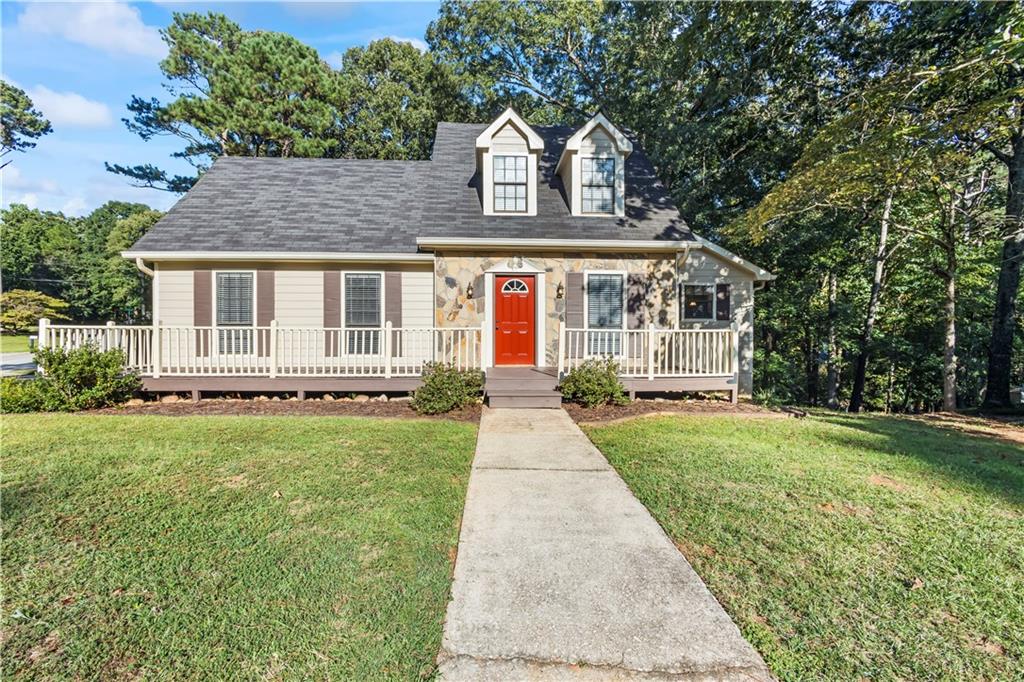 front view of a house with a yard