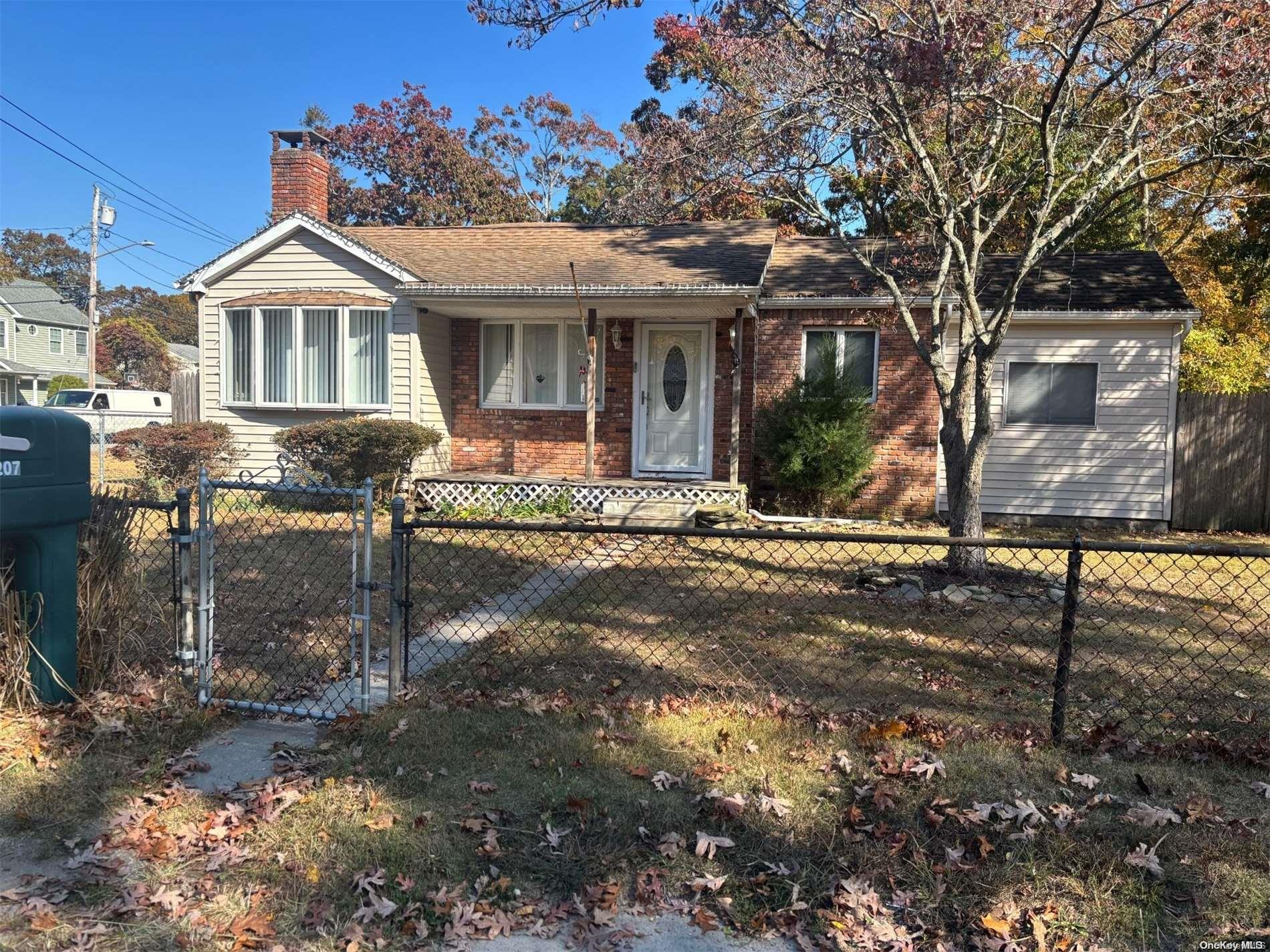 a front view of a house with a porch