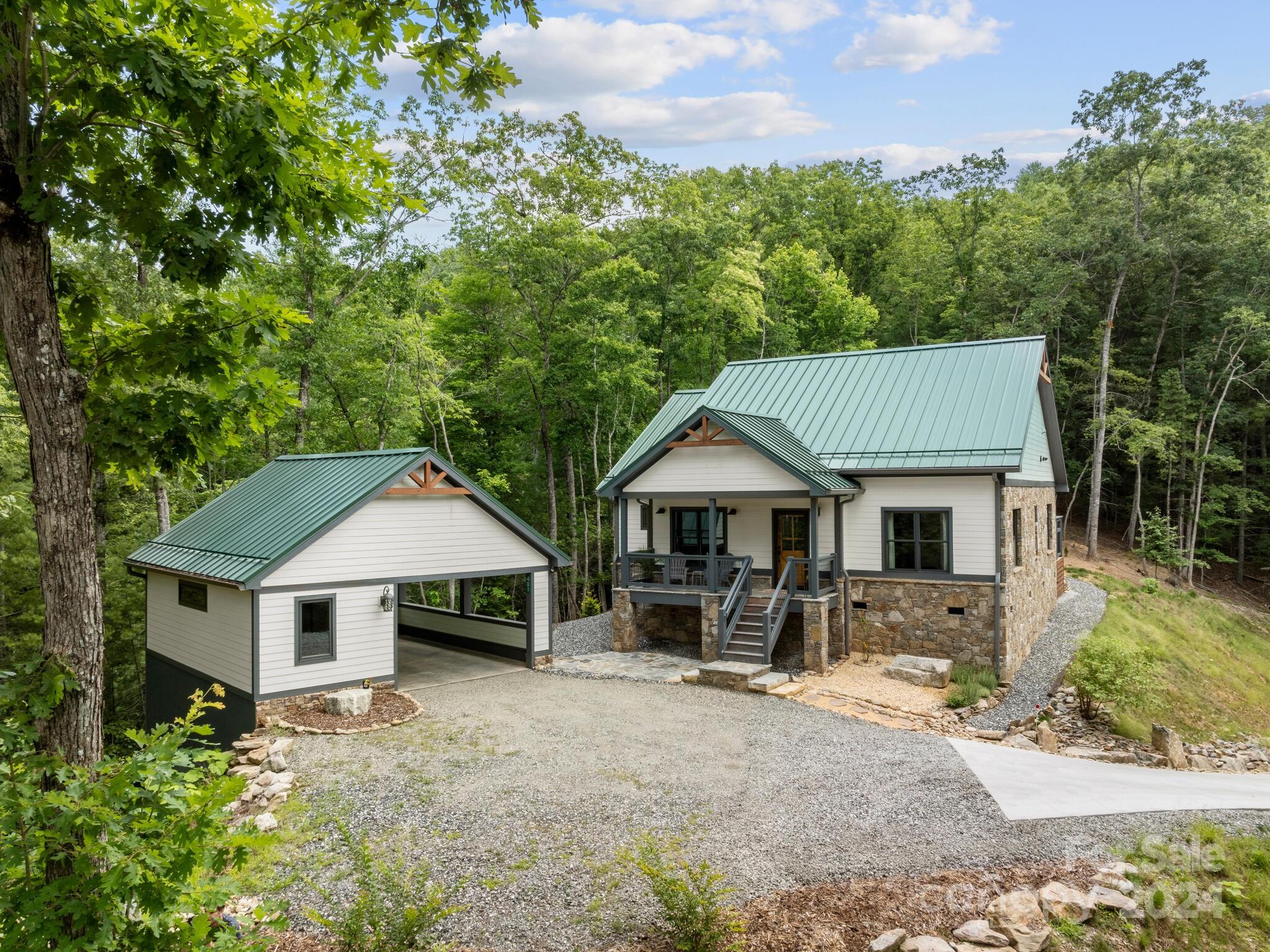 a house with trees in the background