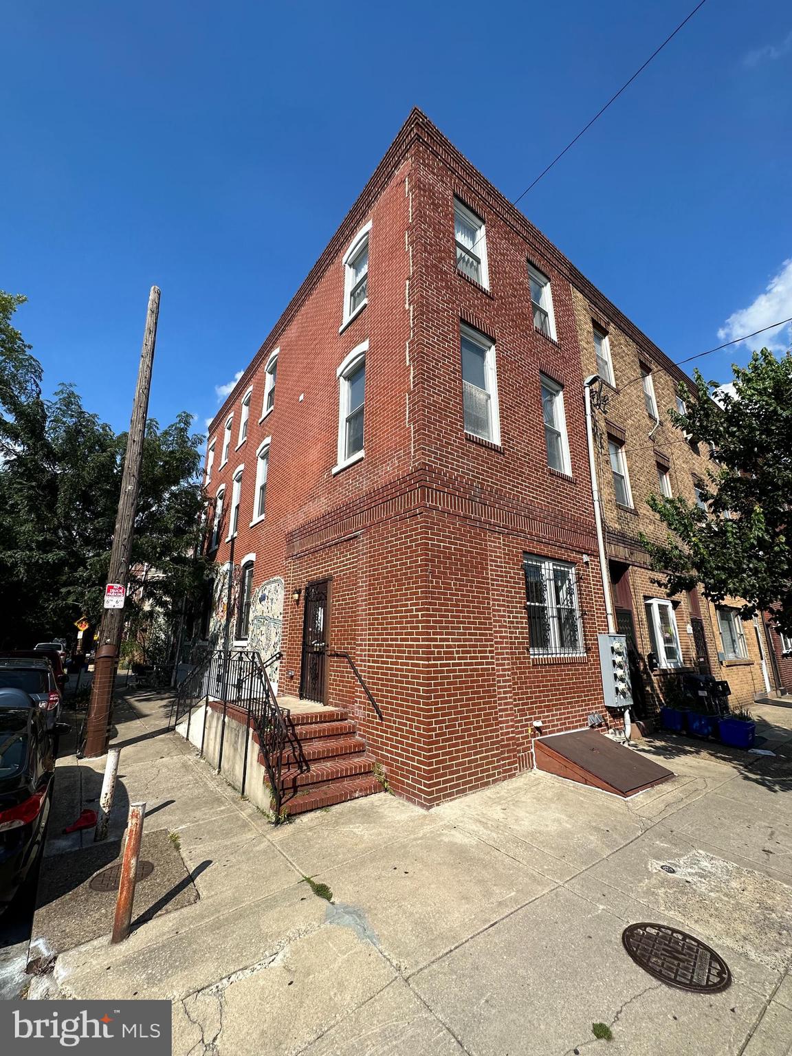 a front view of a house with parking