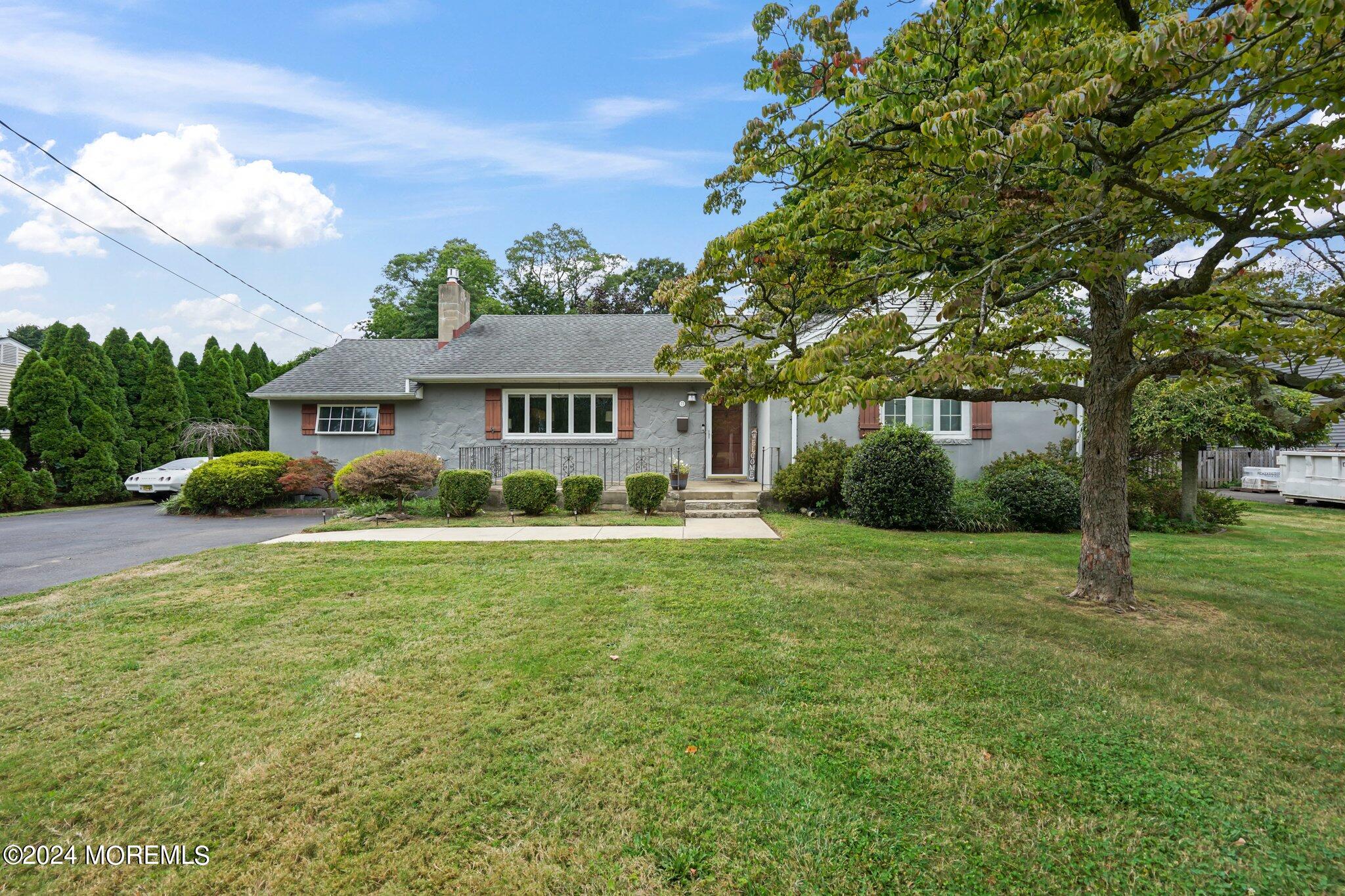 a view of a house with a big yard