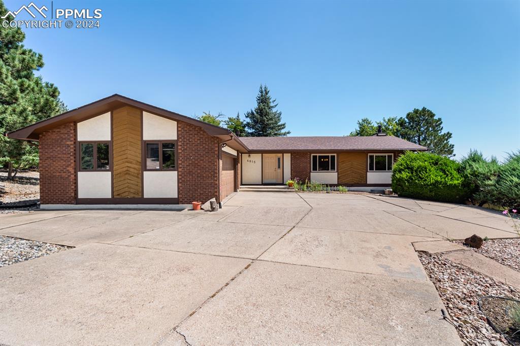 Ranch-style home with a garage