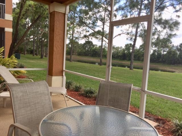 a view of a patio with a backyard