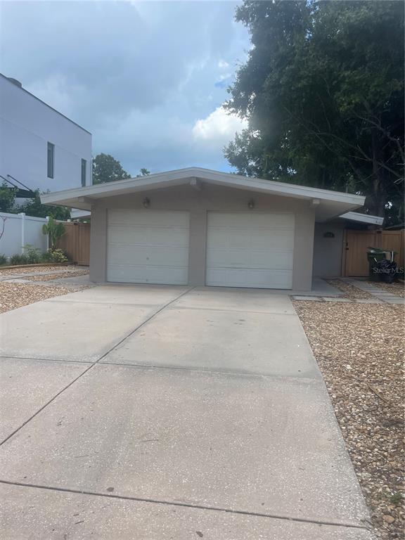 front view of a house with a garage