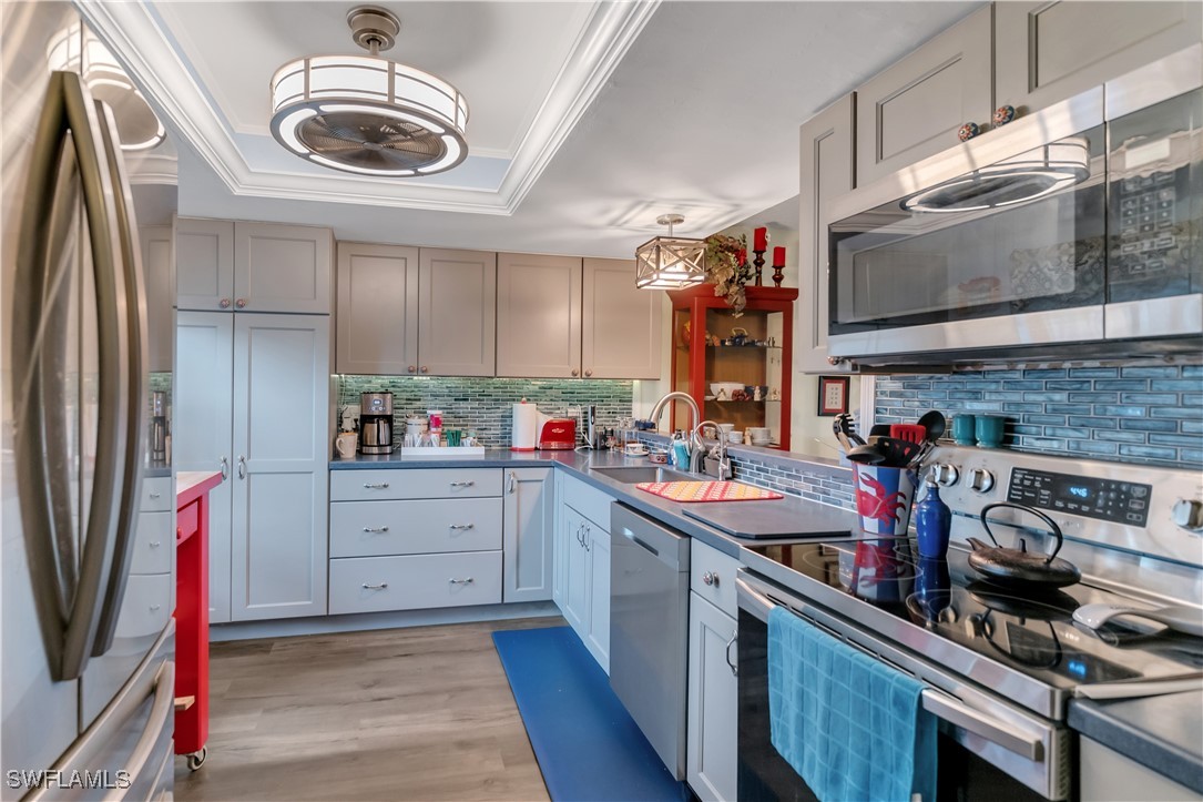 a kitchen that has a lot of cabinets