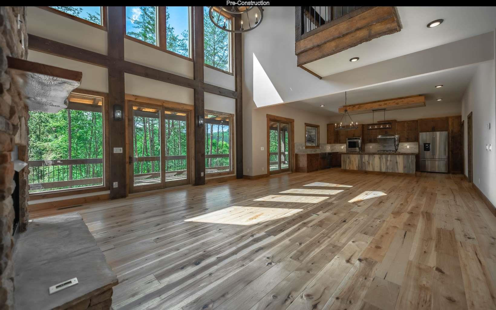 a view of livingroom with furniture window and front door