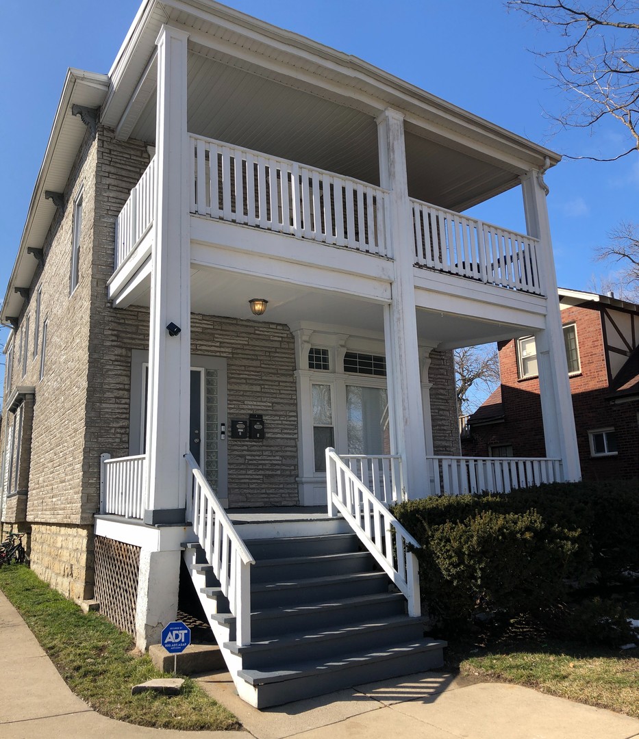 a view of a house with entryway and stairs