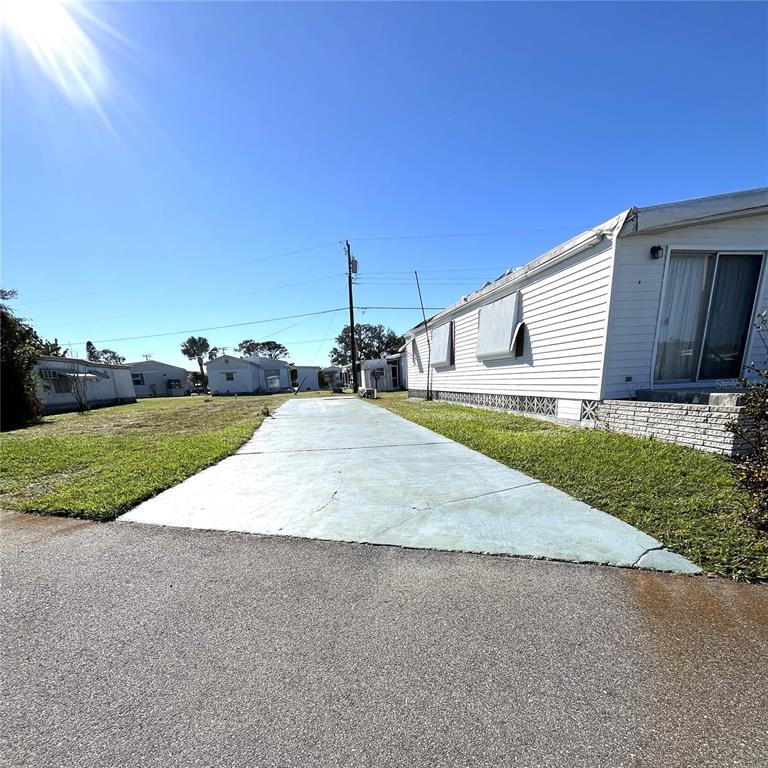 a view of a backyard of the house