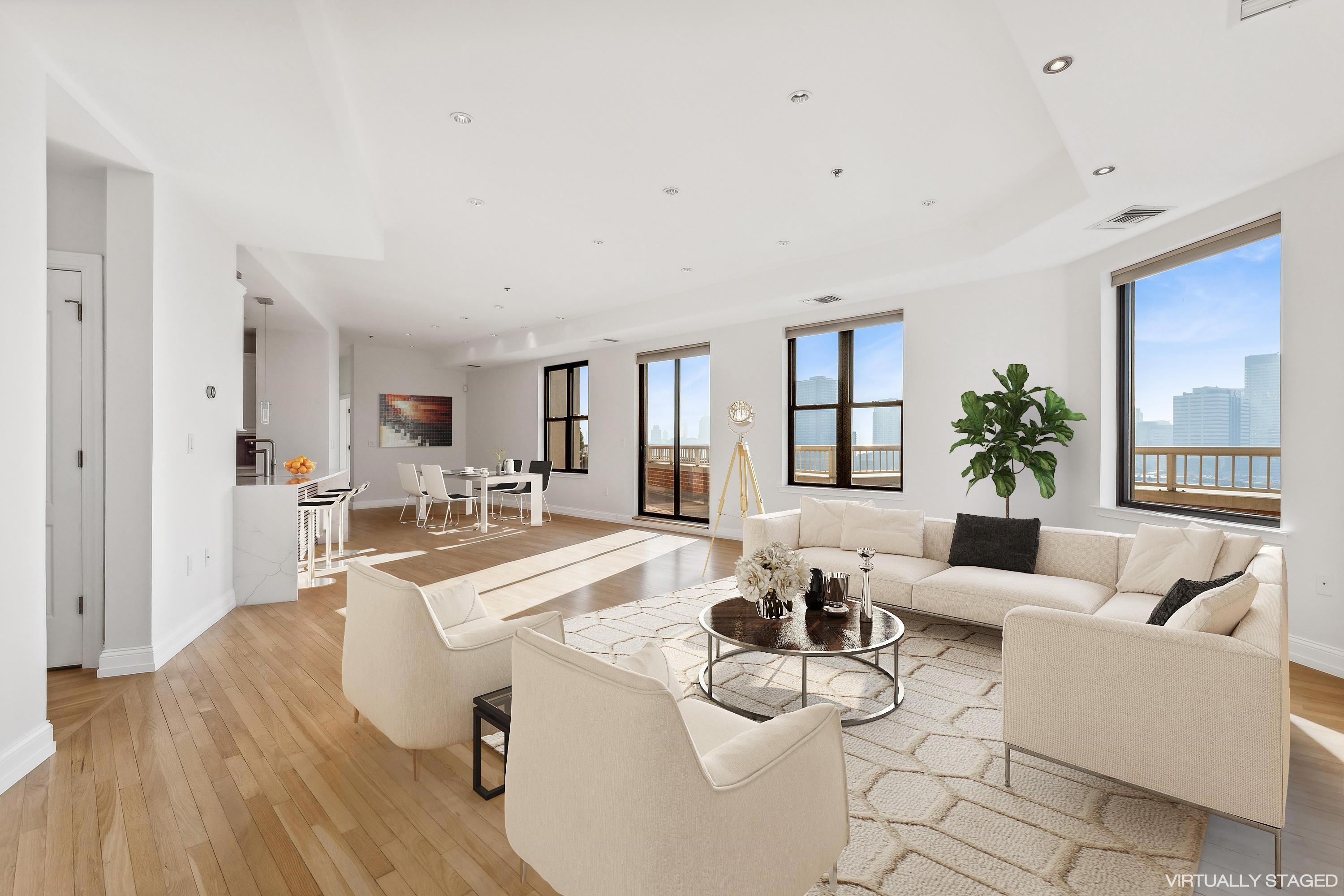 a living room with furniture and a table