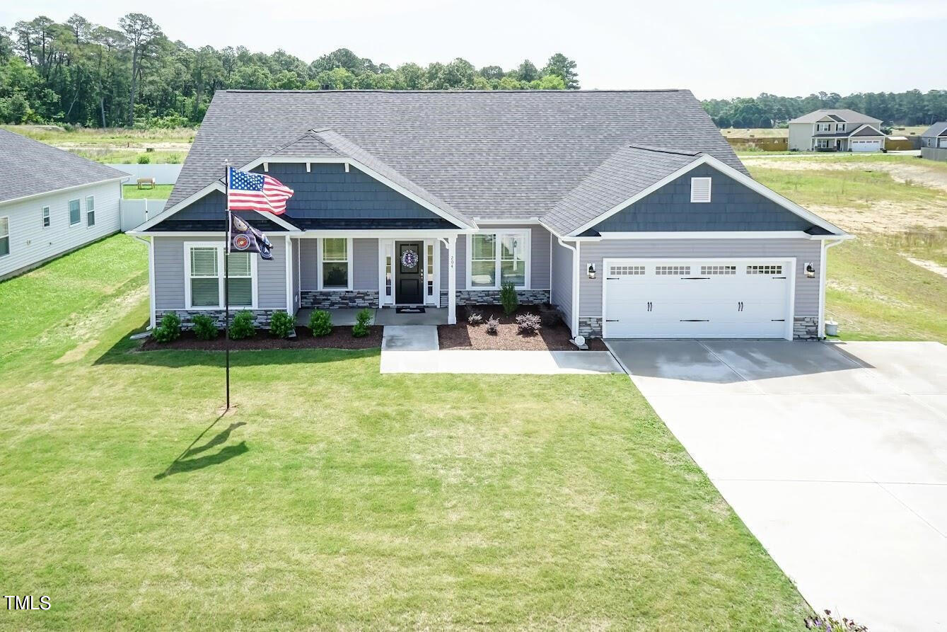 a house view with a garden space