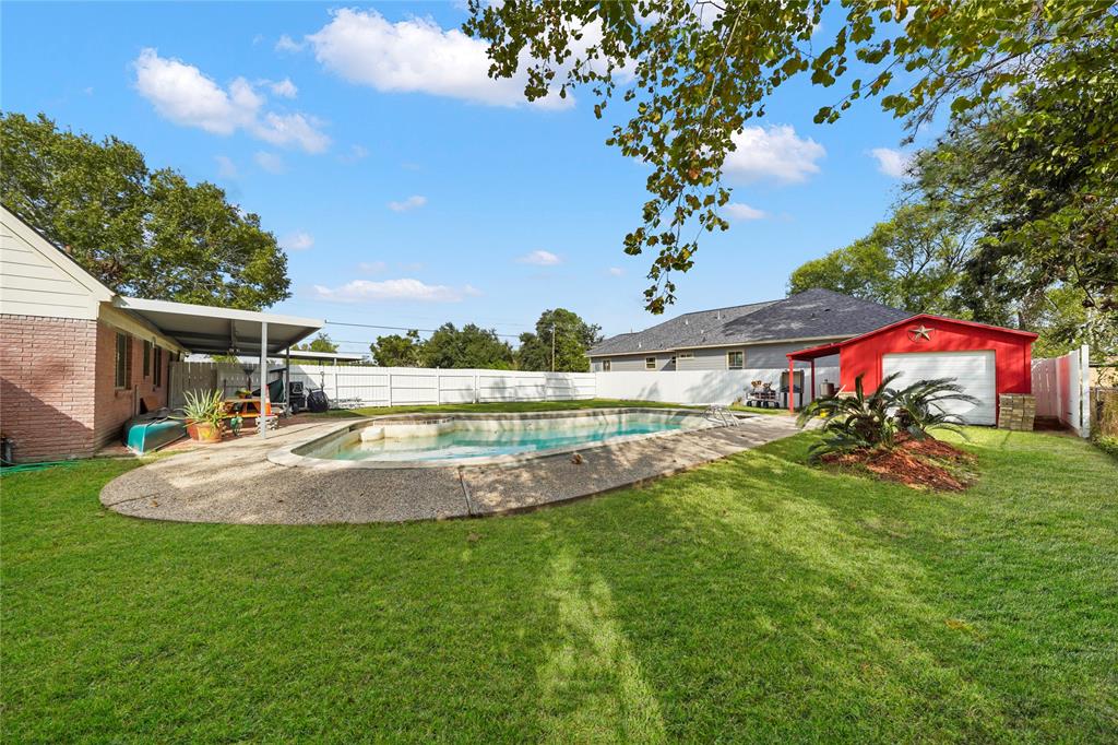 a view of a house with a swimming pool