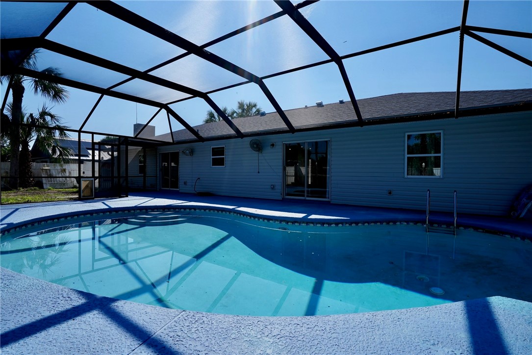 a view of a backyard with a patio