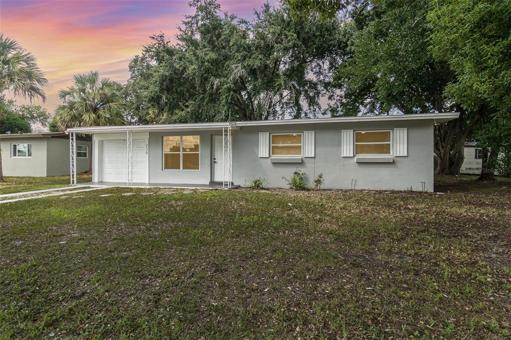 front view of house with a yard