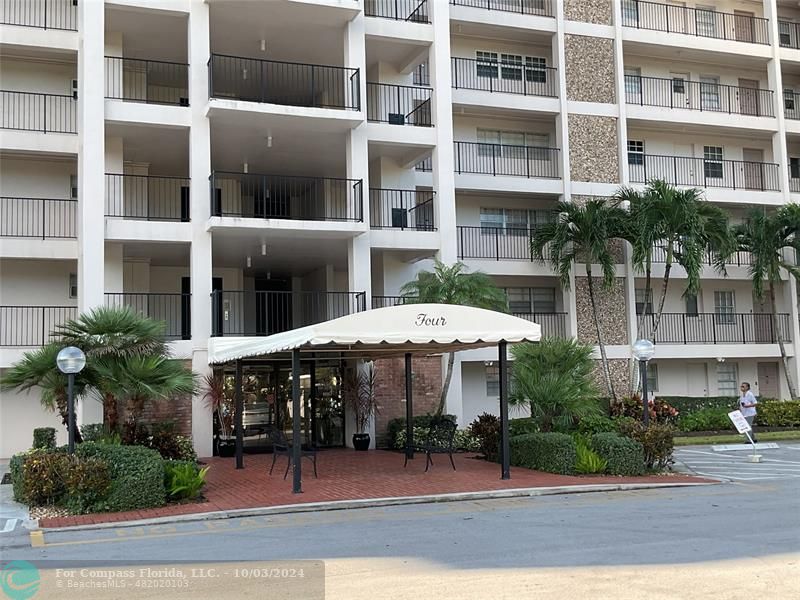 a view of a building with a porch