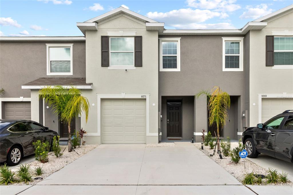 a front view of a house with patio