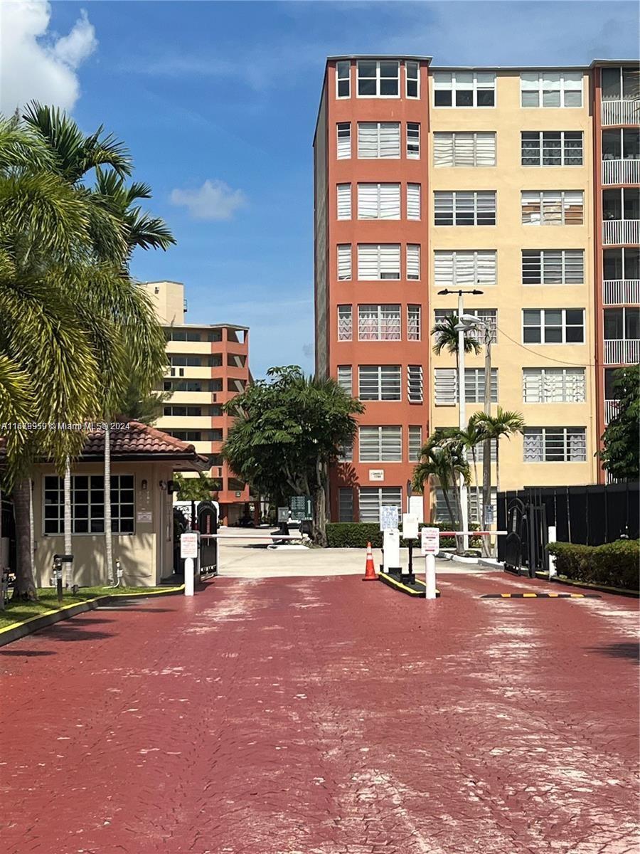 a view of a building with a street