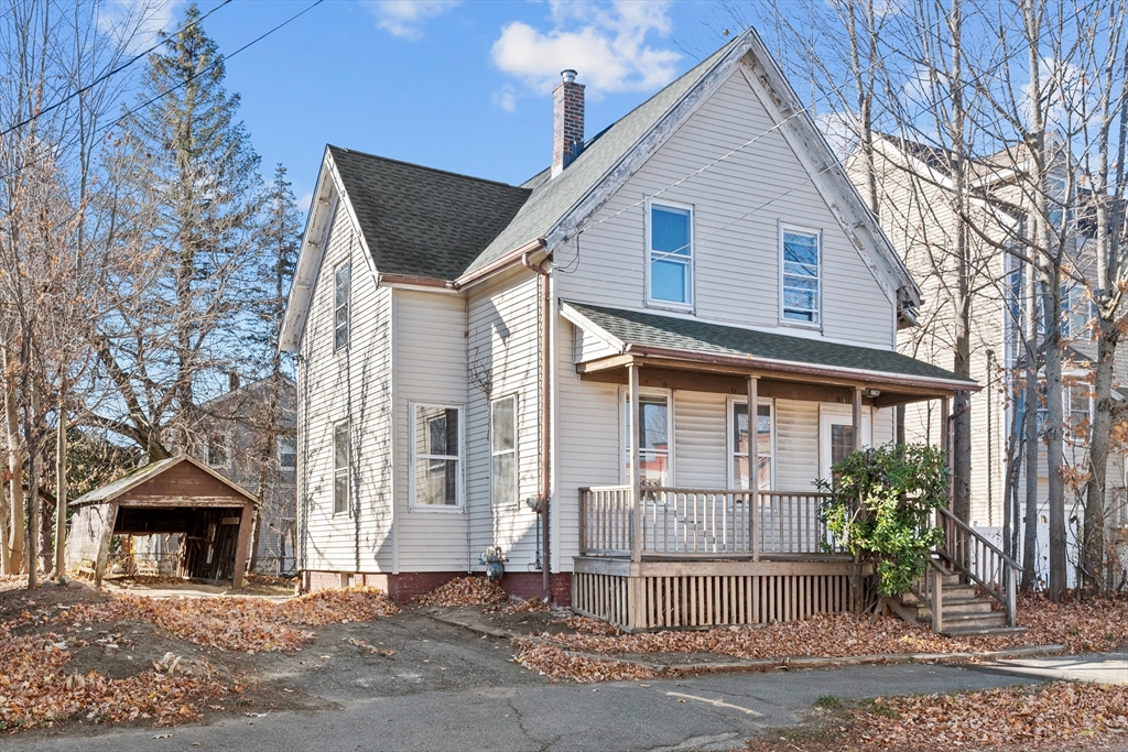 a front view of a house with a porch