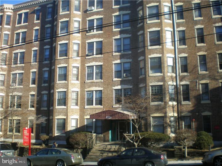 a front view of a building with street