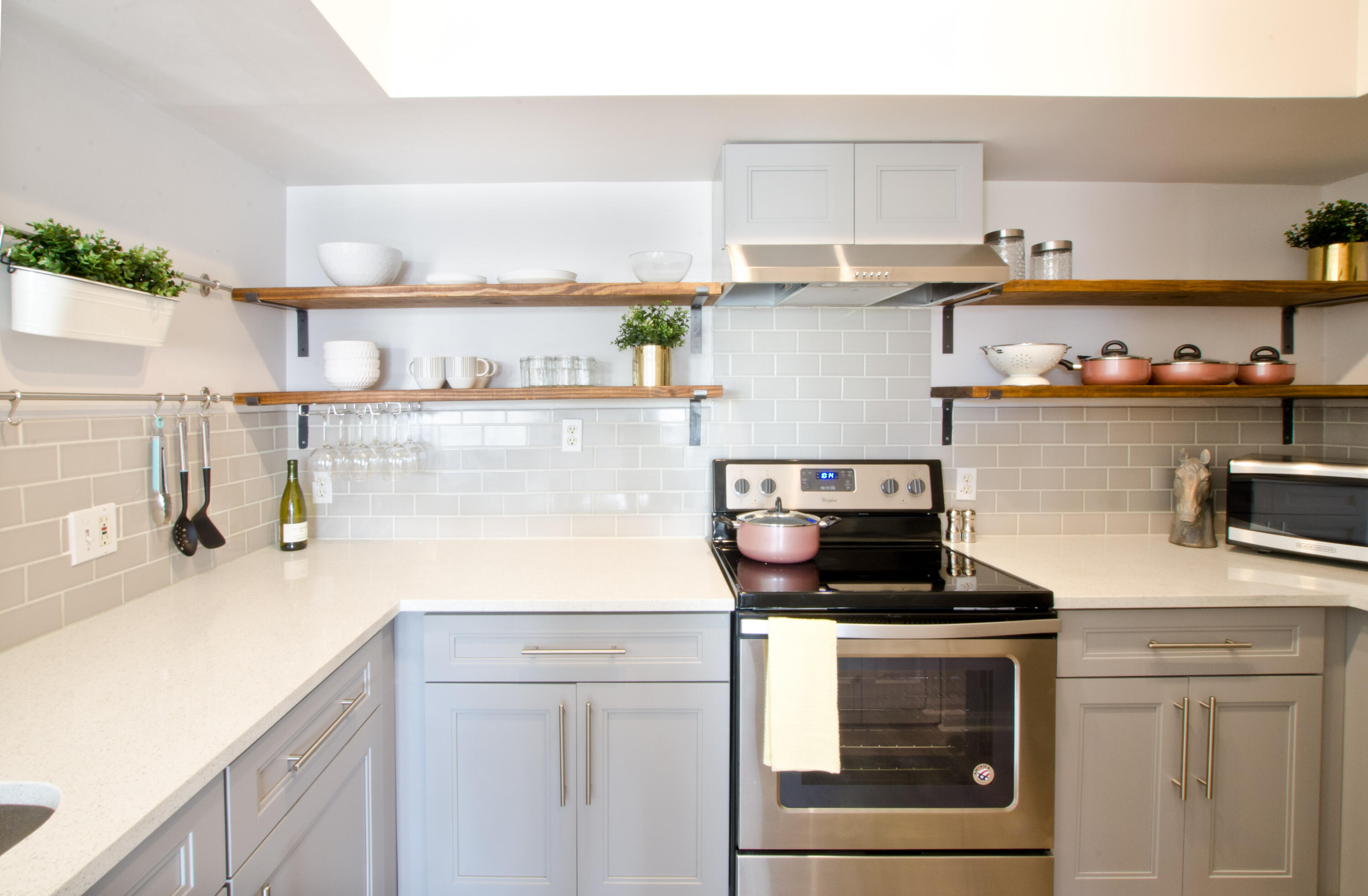 a kitchen with a sink and cabinets