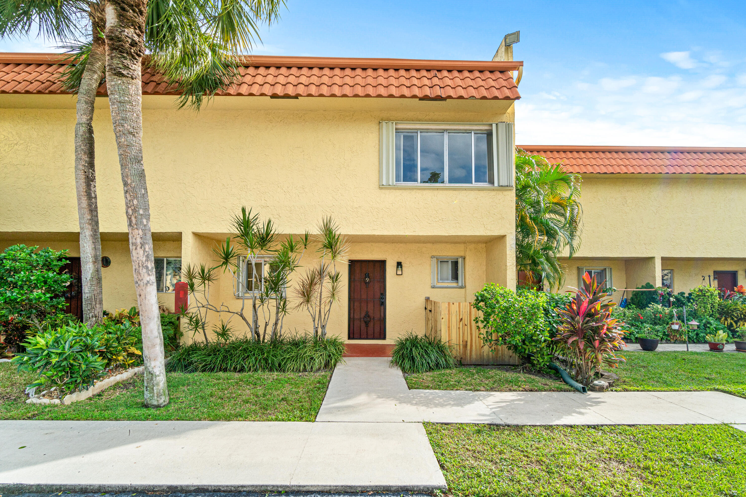 a front view of house with yard