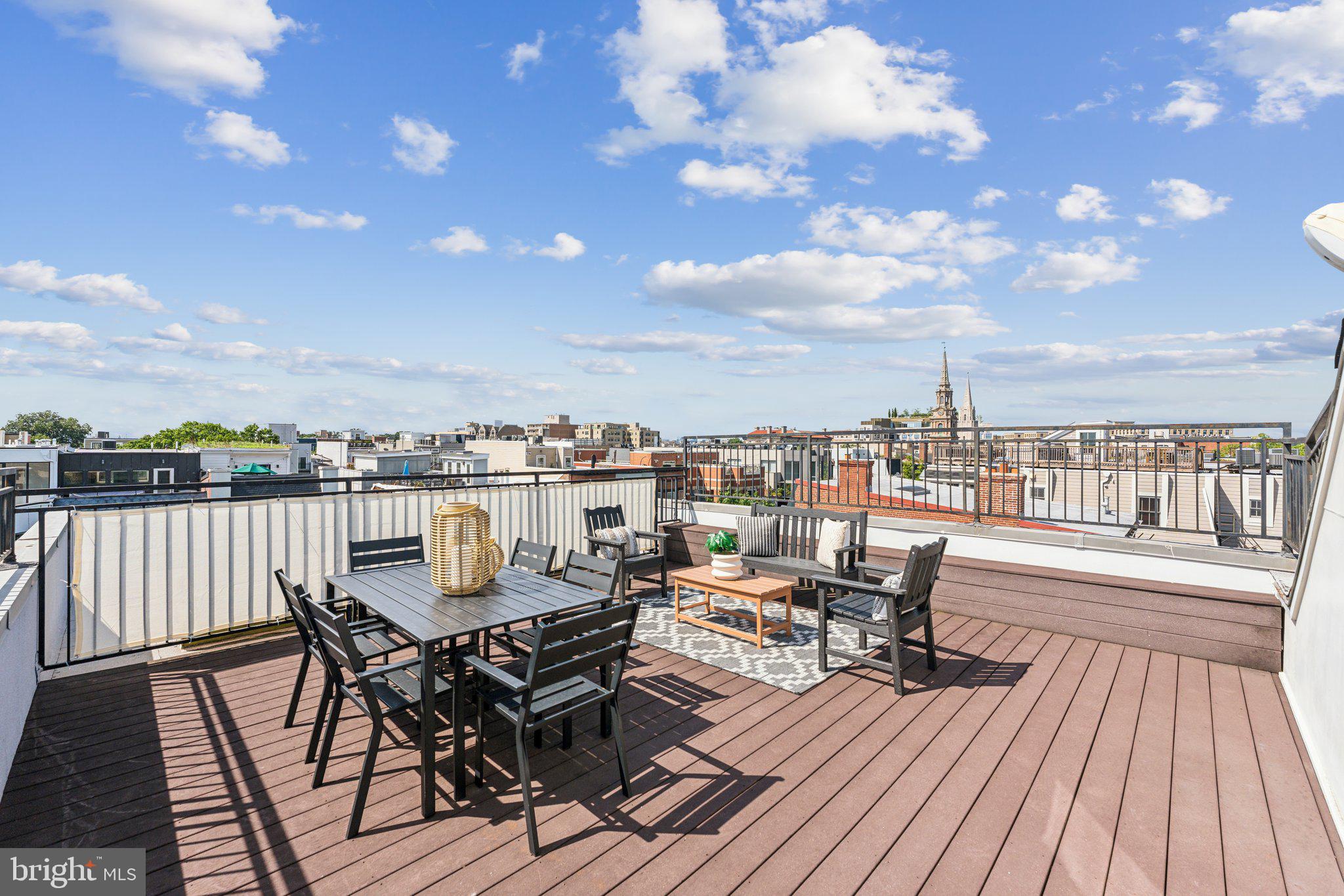 a view of a terrace with seating area