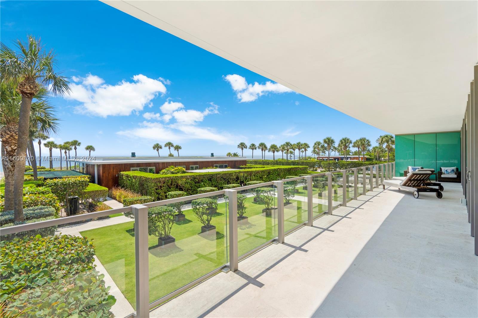 a view of a swimming pool with a patio and a garden