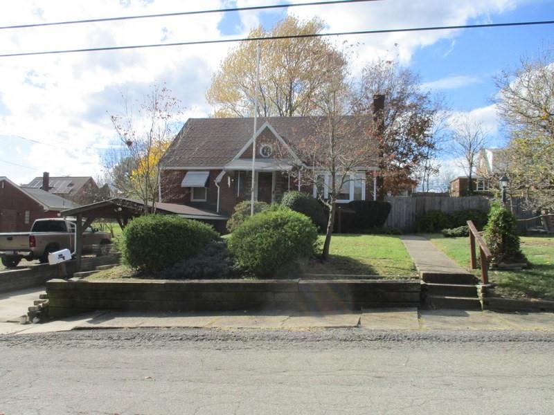 front view of a house with a street