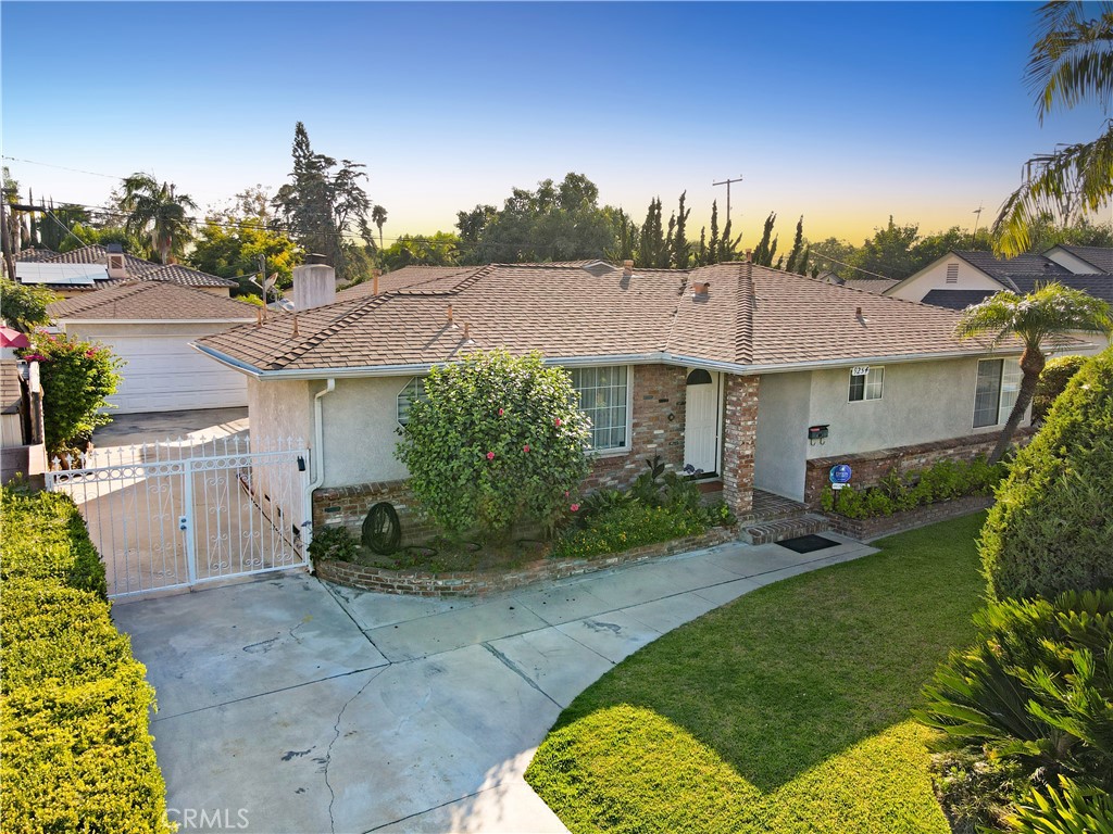 a aerial view of a house with garden