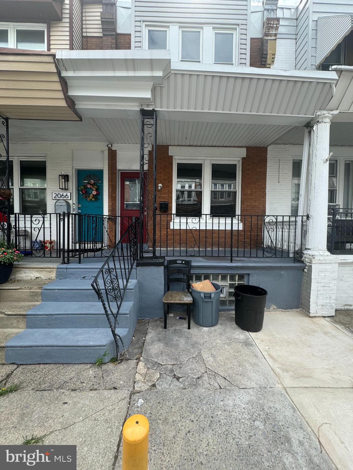 a view of a chairs and table in the patio