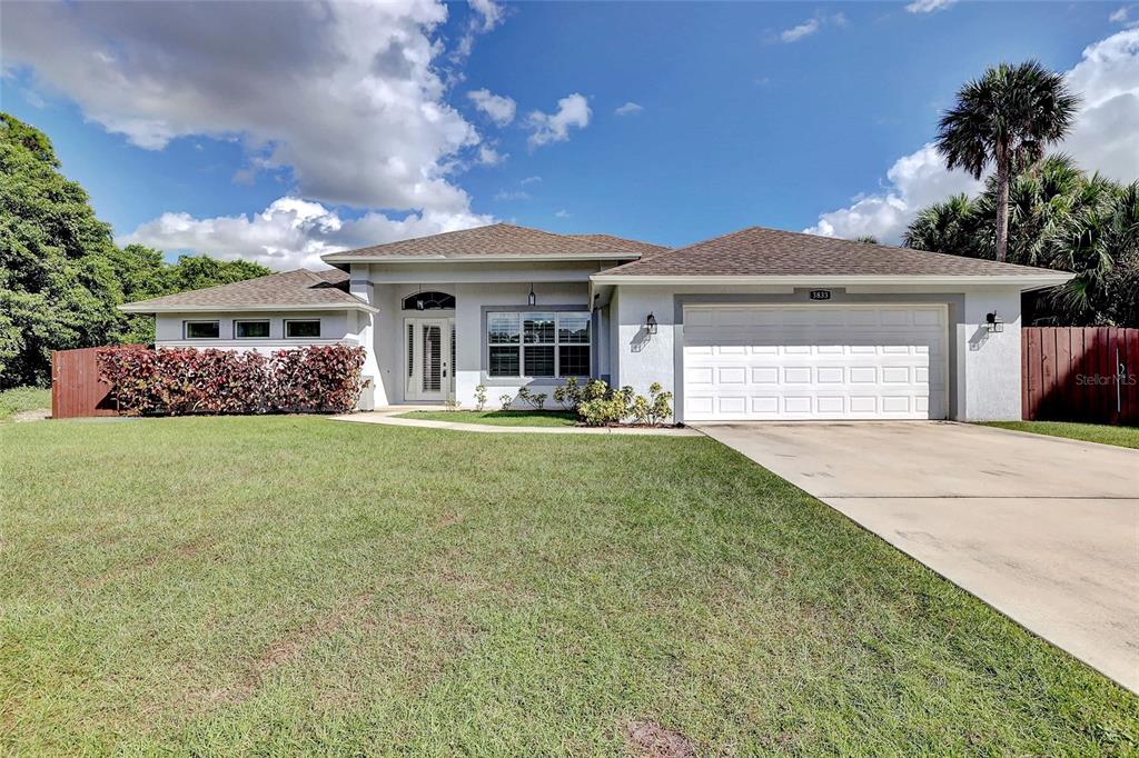 front view of house with a yard