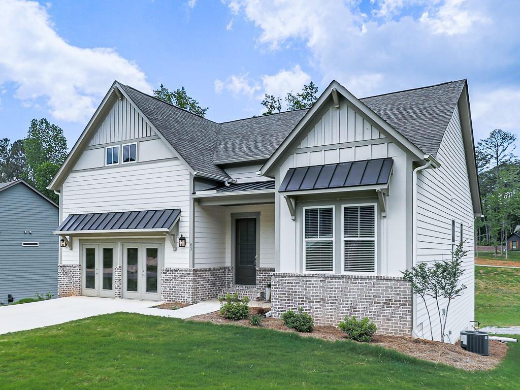 front view of a house with a yard