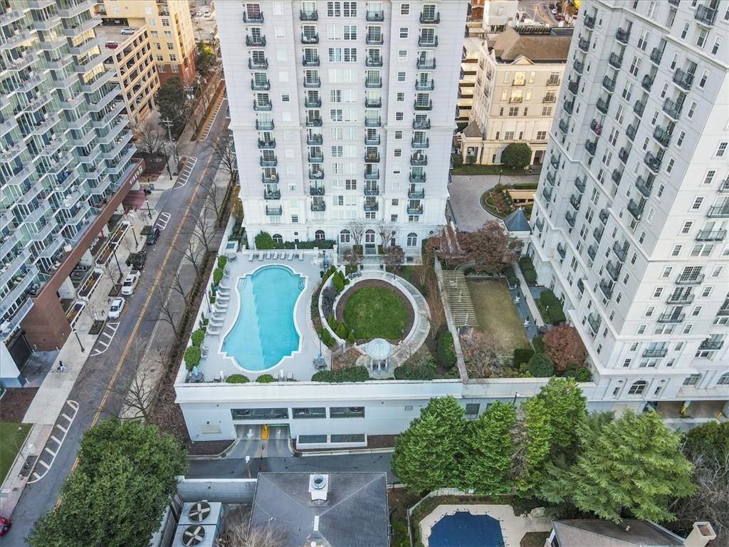 an aerial view of a house with outdoor space