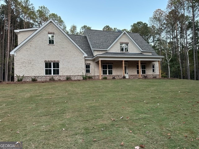 a front view of house with an outdoor space and seating