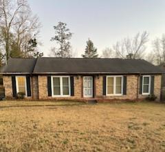 front view of house with a yard