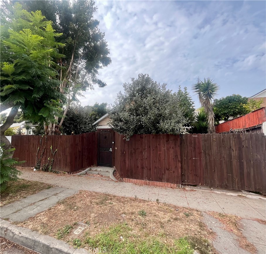 a street view with wooden fence